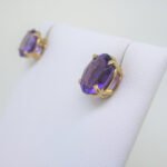 14k Yellow Gold Faceted Oval Cut Amethyst Stud Earrings - Image 2